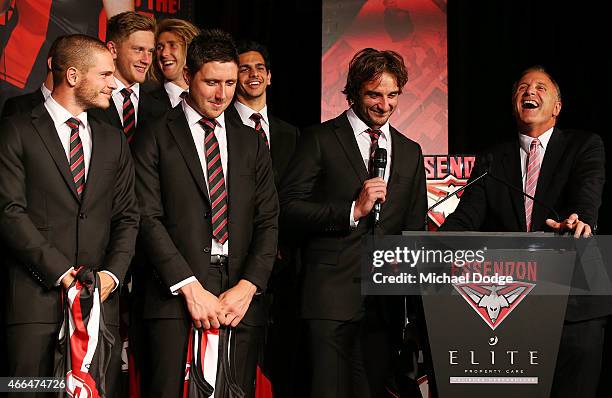 Bombers captain Jobe Watson talks with is father and Bombers legend Tim Watson looks on during the Essendon Bombers 2015 AFL season launch at...
