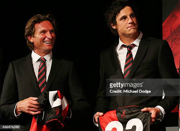 Bombers Head Coach James Hird reacts next to Jake Carlisle during the Essendon Bombers 2015 AFL season launch at Luminare on March 16, 2015 in...