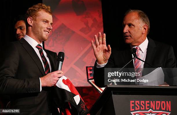 Adam Cooney talks with Bombers legend Tim Watson during the Essendon Bombers 2015 AFL season launch at Luminare on March 16, 2015 in Melbourne,...