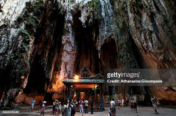 Batu Caves is a Hindu shrine and a tourist attraction on April 01, 2010 in Kuala Lumpur, Malaysia. Batu Caves is a limestone hill that has a series...