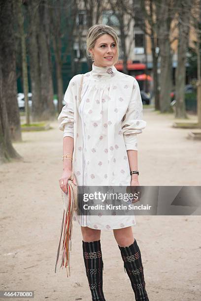 Fashion blogger Sofie Valkiers wears Dior dress and boots, and Barbara Bonner bag on day 7 of Paris Collections: Women on March 09, 2015 in Paris,...