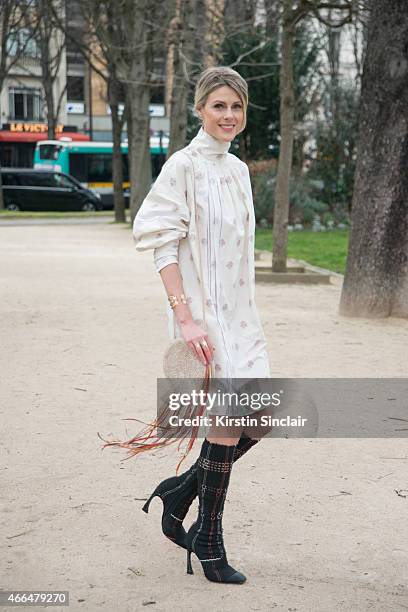 Fashion blogger Sofie Valkiers wears Dior dress and boots, and Barbara Bonner bag on day 7 of Paris Collections: Women on March 09, 2015 in Paris,...