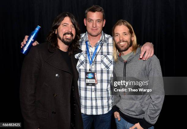 Musician Dave Grohl, VP of Sports, Entertainment, Advertising Production Anheuser-Busch Mike Sundet and musician Taylor Hawkins attend the Bud Light...