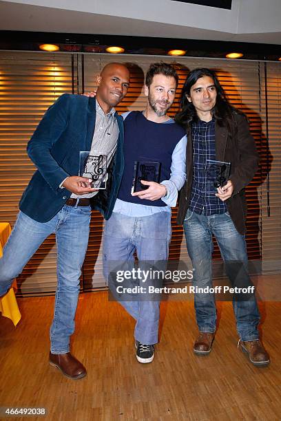 Autor Michael Seilhan-Ibrahim, Autor, Composer and Singer Christophe Mae and Composer Felipe Saldivia pose with their 'Song Award' for the song...