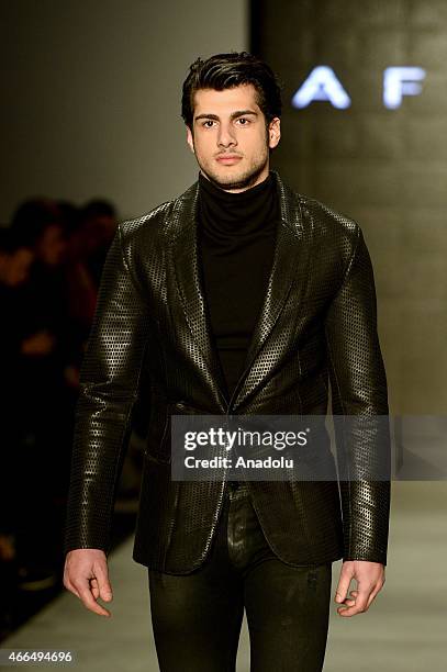 Model walks the runway at Affairs spring/winter 2015-2016 show during Mercedes Benz Fashion Week at the Istanbul Modern in Turkey on March 16,2015.