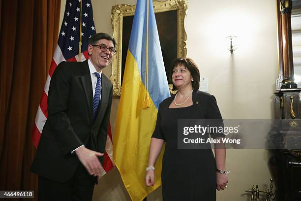 Secretary of the Treasury Jacob Lew poses with Ukrainian Finance Minister Natalie Jaresko prior to a meeting at the Treasury Department March 16,...