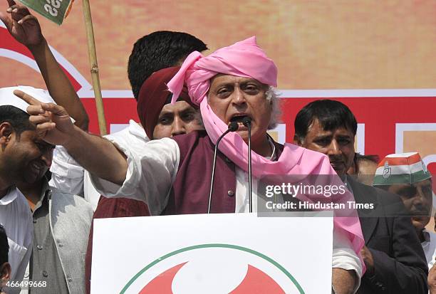 Congress leader Jairam Ramesh addressing the Youth Congress workers during their protest against the Land Acquisition bill at Jantar Mantar on March...