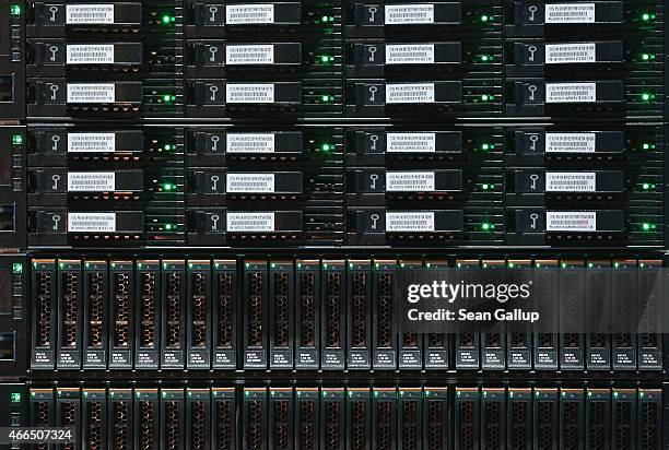 Units for storing digital data lie plugged into an IBM System Storage DS8870 mainframe at the 2015 CeBIT technology trade fair on March 16, 2015 in...