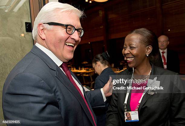 German Foreign Minister Frank-Walter Steinmeier and Foreign Minister of Rwanda, Louise Mushikiwabo greet each other at the 50th Munich Security...