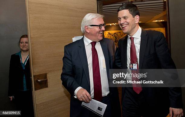 German Foreign Minister Frank-Walter Steinmeier and British MP David Miliband greet one another at the 50th Munich Security Conference on February...