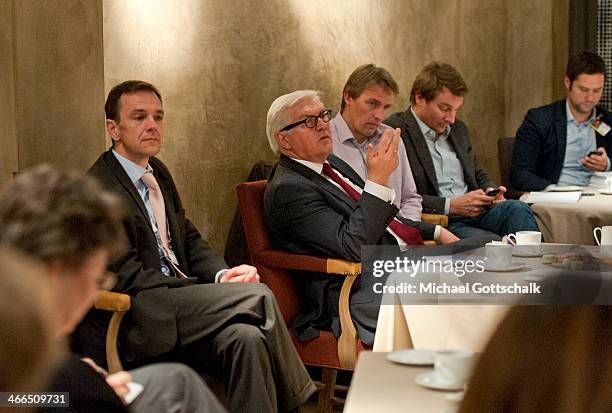 German Foreign Minister Frank-Walter Steinmeier and his spokesman Martin Schaefer in conversation with journalists at the 50th Munich Security...