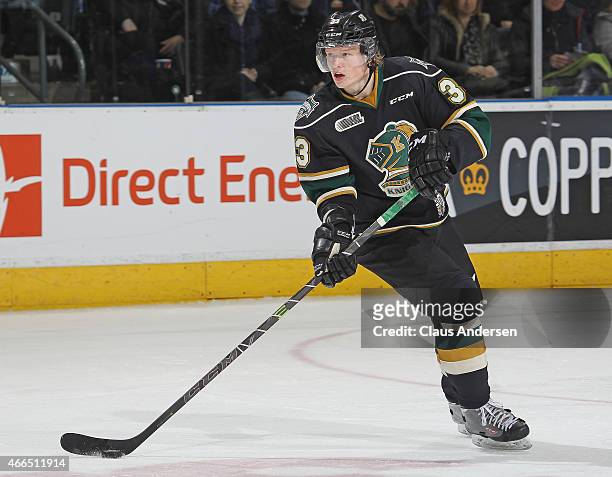 Julius Bergman of the London Knights skates with the puck against the Owen Sound Attack during an OHL game at Budweiser Gardens on March 13, 2015 in...