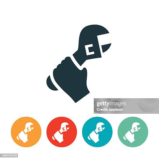 hand hält ein schraubenschlüssel-symbol - adjustable wrench stock-grafiken, -clipart, -cartoons und -symbole