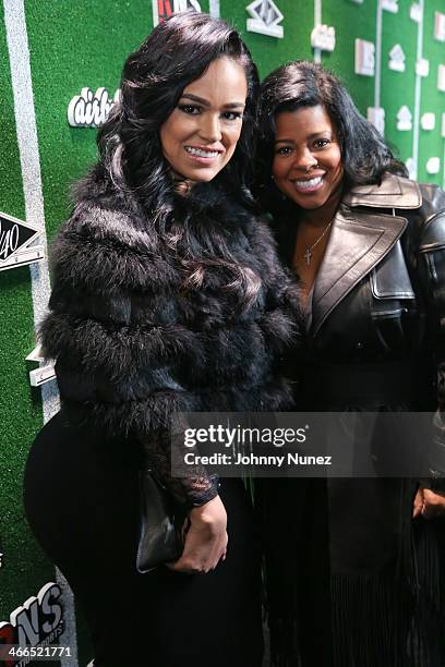 Emily Bustamante and Chrissy Lampkin attend Roc Nation Sports Celebration Presented By Airbnb At The 40/40 Club on February 1, 2014 in New York City.