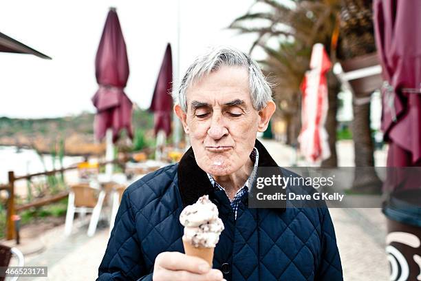 happiness is... - senior men eating stock pictures, royalty-free photos & images