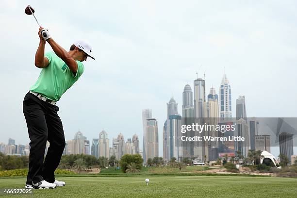Thorbjorn Olesen of Denmark tees off on the eighth hole during the final round of the 2014 Omega Dubai Desert Classic on the Majlis Course at the...