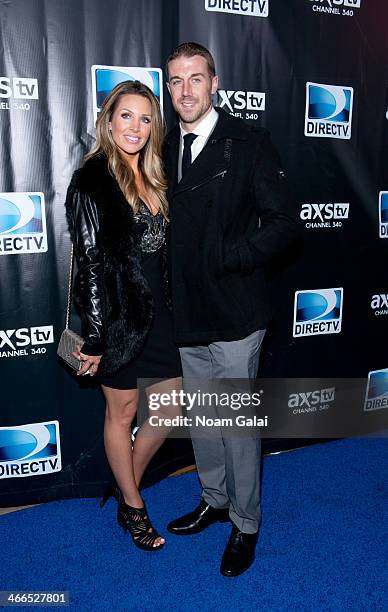 Quaterback Alex Smith and his wife Elizabeth Barry attend the DirecTV Super Saturday Night at Pier 40 on February 1, 2014 in New York City.