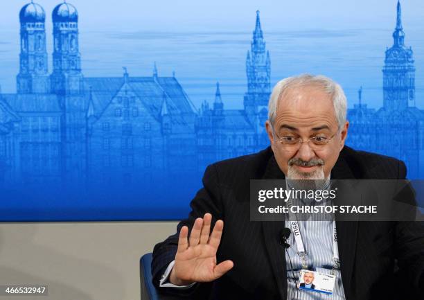 Iranian Foreign Minister Mohammad Javad Zarif waves prior to a panel discussion during the 50th Munich Security Conference on February 2, 2014 in...