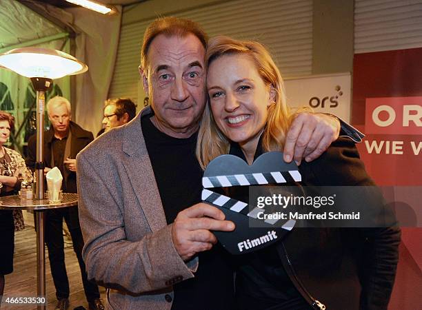 Actors Dietrich Siegl and Lilian Klebow pose for a photograph during the Flimmit launch party at Summerstage on March 16, 2015 in Vienna, Austria.