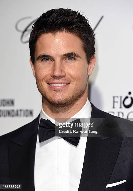 Robbie Amell attends the Elton John AIDS Foundation's 23rd annual Academy Awards Viewing Party at The City of West Hollywood Park on February 22,...