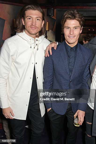 Tom Kilbey and Oliver Cheshire attend the "Dior And I" UK Premiere after party at Loulou's on March 16, 2015 in London, England.