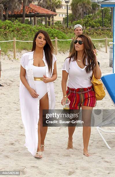 Kim Kardashian and her sister Kourtney Kardashian are seen filming scenes for 'Keeping Up with the Kardashians' on September 24, 2012 in Miami,...