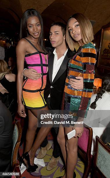 Sigail Currie, Olivier Rousteing and Jourdan Dunn attend the dinner, hosted by Olivier Rousteing, to mark the opening of Balmain's first London...