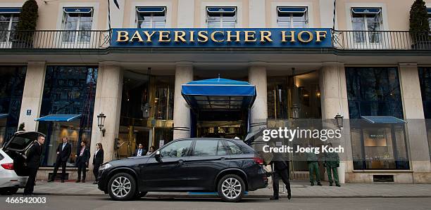 Guests leave the 50th Munich Security Conference in front of the Bayerischer Hof hotel on February 2, 2014 in Munich, Germany. The Munich Security...