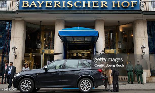 Guests leave the 50th Munich Security Conference in front of the Bayerischer Hof hotel on February 2, 2014 in Munich, Germany. The Munich Security...