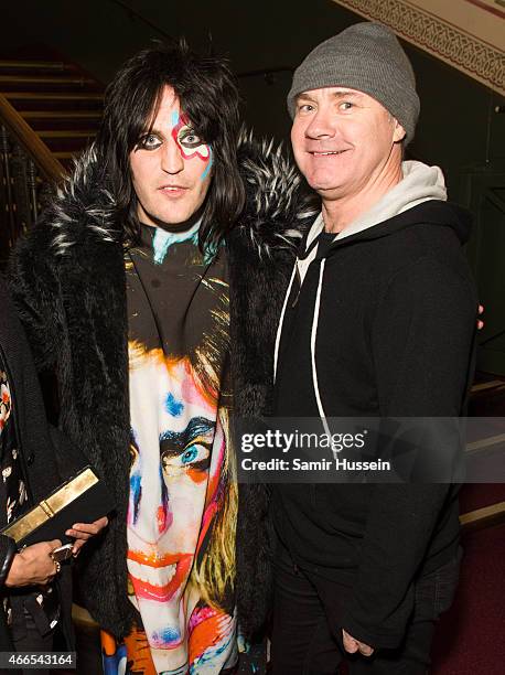 Noel Fielding and Damien Hirst attend a private view of the Noel Fielding art exhibition 'He Wore Dreams Around Unkind Faces' at the Royal Albert...