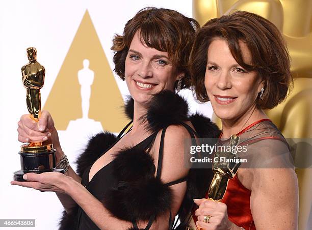 Ellen Goosenberg Kent and Dana Perry pose in the press room with the award for Best Documentary Short Subject at the 87th Annual Academy Awards at...