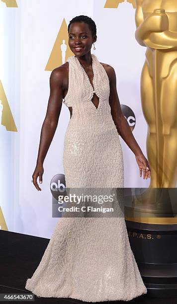 Actress Lupita Nyong'o poses in the Press Room during the 87th Annual Academy Awards at Loews Hollywood Hotel on February 22, 2015 in Hollywood,...