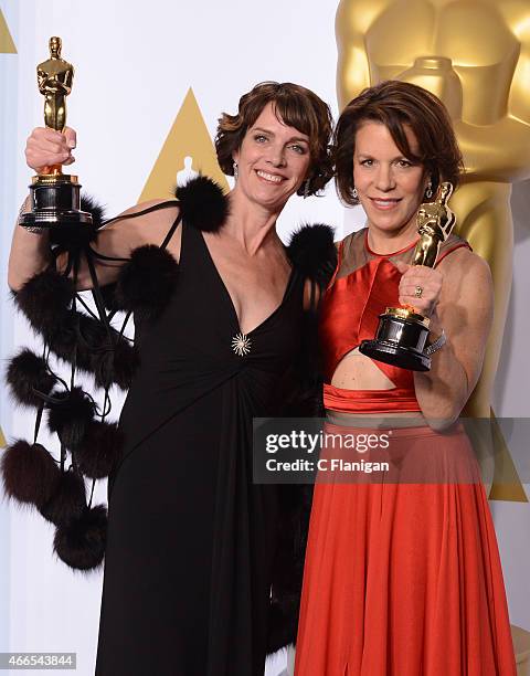 Ellen Goosenberg Kent and Dana Perry pose in the press room with the award for Best Documentary Short Subject at the 87th Annual Academy Awards at...