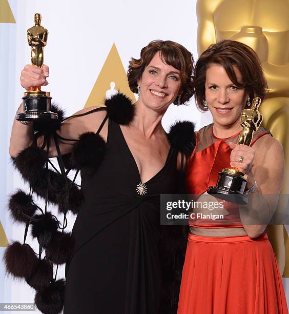 Ellen Goosenberg Kent and Dana Perry pose in the press room with the award for Best Documentary Short Subject at the 87th Annual Academy Awards at...