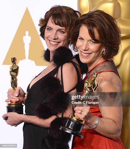 Ellen Goosenberg Kent and Dana Perry pose in the press room with the award for Best Documentary Short Subject at the 87th Annual Academy Awards at...