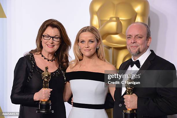 Makeup artists Frances Hannon and Mark Coulier pose with actress Reese Witherspoon in the press room during the 87th Annual Academy Awards at Loews...