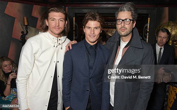 Tom Kilbey, Oliver Cheshire and guest attend the "Dior And I" UK Premiere after party at Loulou's on March 16, 2015 in London, England.