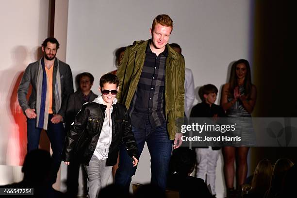 Charlie Jennison and Frederik Andersen attend the Anaheim Lady Ducks Fashion Show Luncheon with Bloomingdale's South Coast Plaza on March 16, 2015 in...