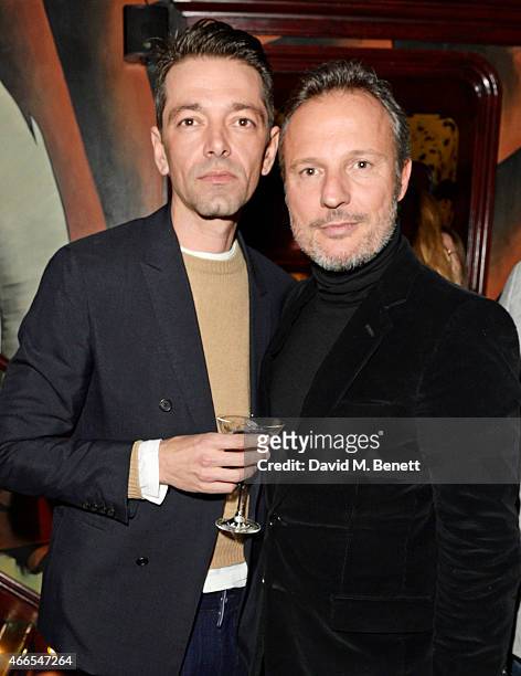Dior designer Pieter Mulier and Olivier Bialobos attend the "Dior And I" UK Premiere after party at Loulou's on March 16, 2015 in London, England.