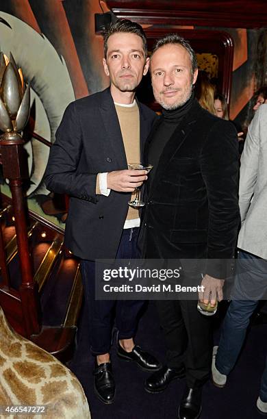 Dior designer Pieter Mulier and Olivier Bialobos attend the "Dior And I" UK Premiere after party at Loulou's on March 16, 2015 in London, England.