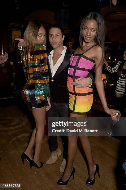 Jourdan Dunn, Olivier Rousteing and Sigail Currie attend the dinner, hosted by Olivier Rousteing, to mark the opening of Balmain's first London...