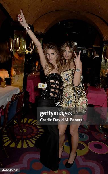 Allison Kadoche and Claudia Ruimy attend a party hosted by Olivier Rousteing, to mark the opening of Balmain's first London store, at Annabel's on...