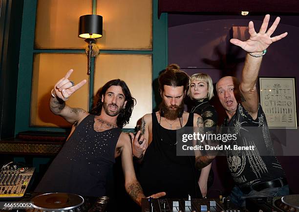 Liam Young, Jon Astrop and Sunta Templeton perform at a private view of "He Wore Dreams Around Unkind Faces", an exhibition by Noel Fielding, at the...