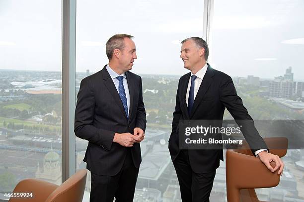 Graham Kerr, chief executive officer-elect of South32 Ltd., left, and Brendan Harris, chief financial officer-elect of South32 Ltd., pose for a...