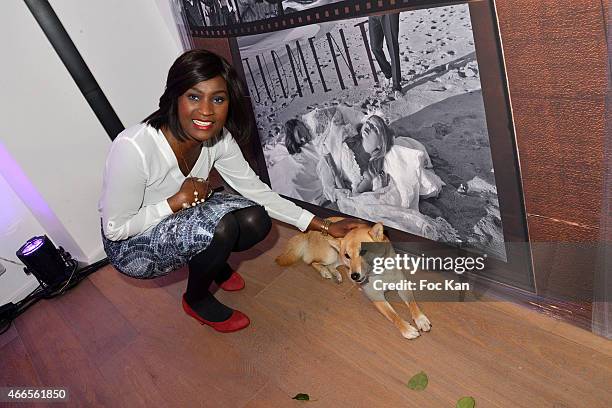 Natacha Benda and dog Celeste attend 'Du Mythe A La Realite' Arlinda Mestre Photo Exhibition Preview at Espace Morin Du Vertbois on March on March...