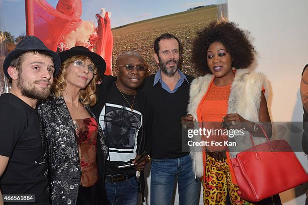 Joey Mestre, his mother Arlinda Mestre, David Monsoh, Christian Vadim and Jane Salvi attend 'Du Mythe A La Realite' Arlinda Mestre Photo Exhibition...