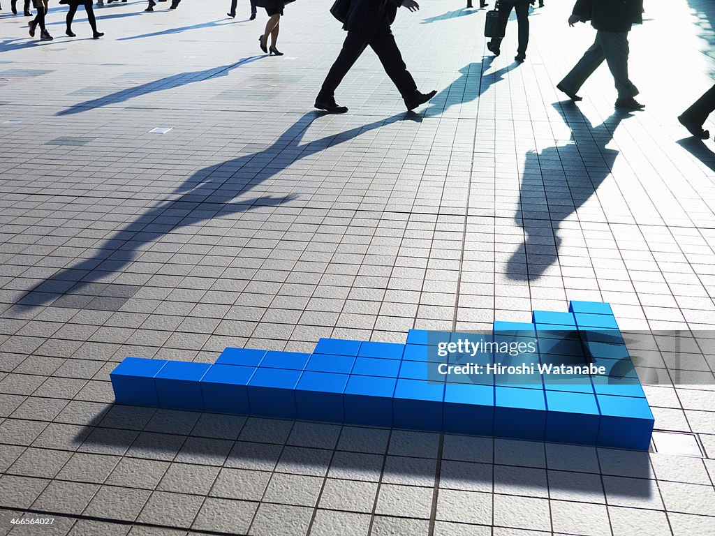 Businessmen walking with barograph