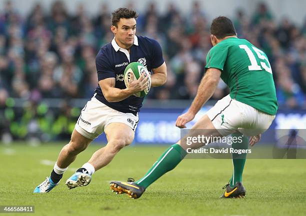 Max Evans of Scotland takes on Rob Kearney during the RBS Six Nations match between Ireland and Scotland at the Aviva Stadium on February 2, 2014 in...