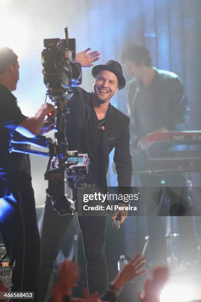 Gavin DeGraw waves to the camera when he performs during VH1's "Super Bowl Blitz: Six Nights + Six Concerts" at The Wellmont Theatre on February 1,...