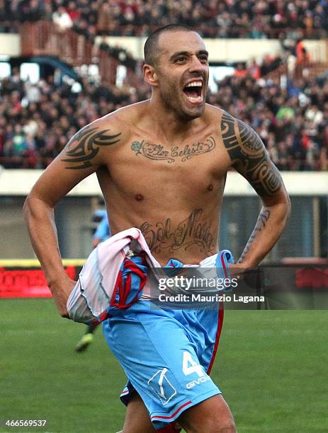 Sergio Almiron of Catania celebrates after scoring their third goal during the Serie A match between Calcio Catania and AS Livorno Calcio at Stadio...